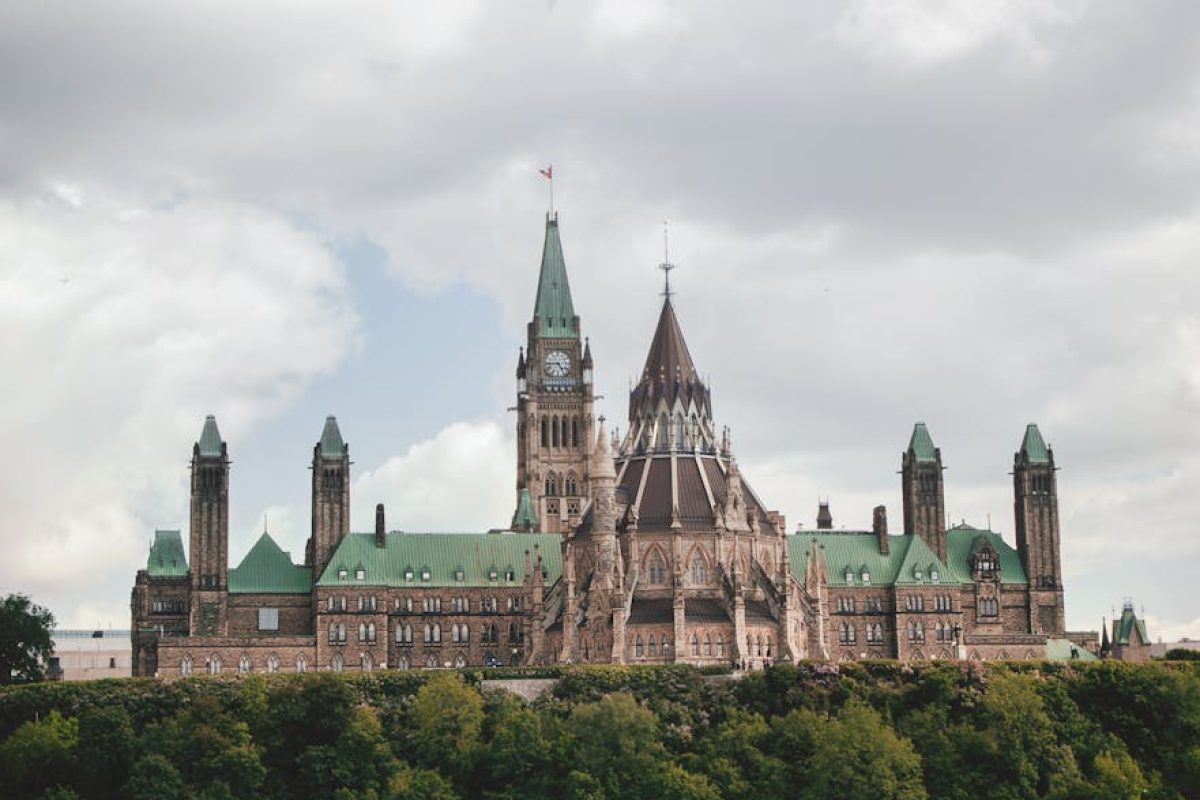 Stunning view of the Gothic Revival Parliament Hill buildings in Ottawa during summer.