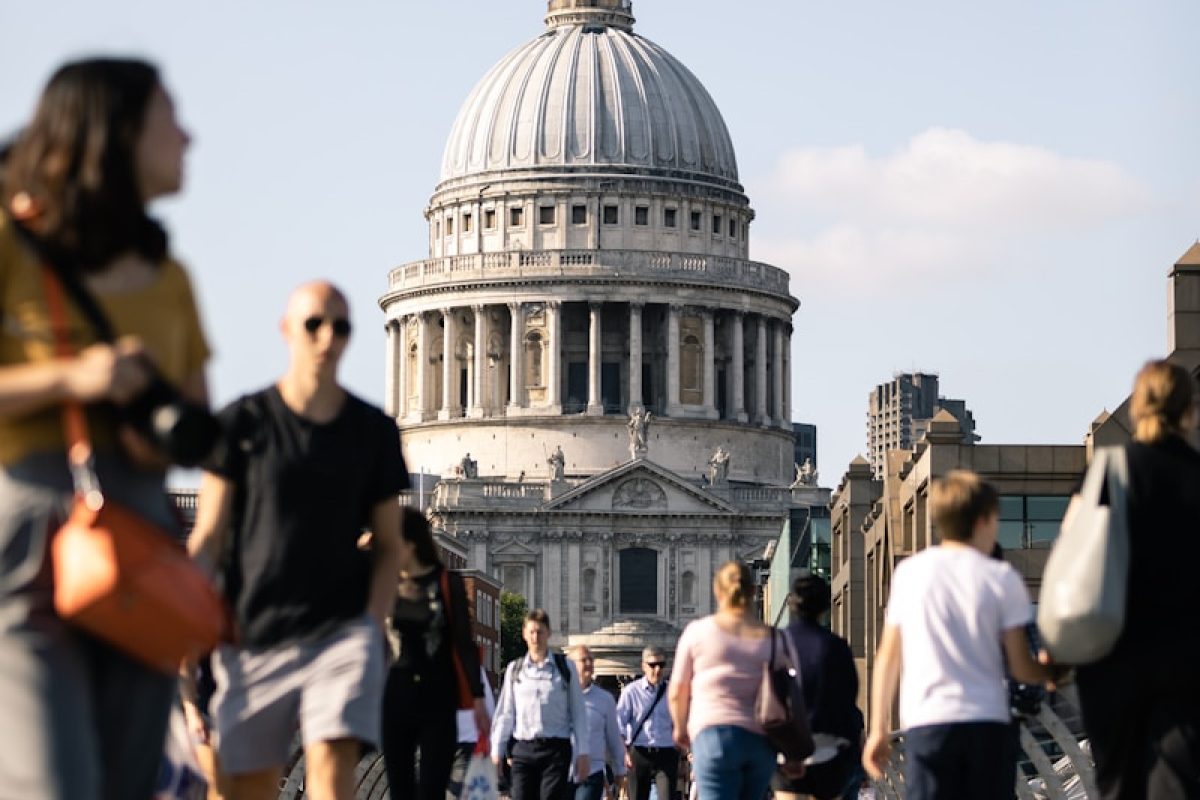 people walking on bridge