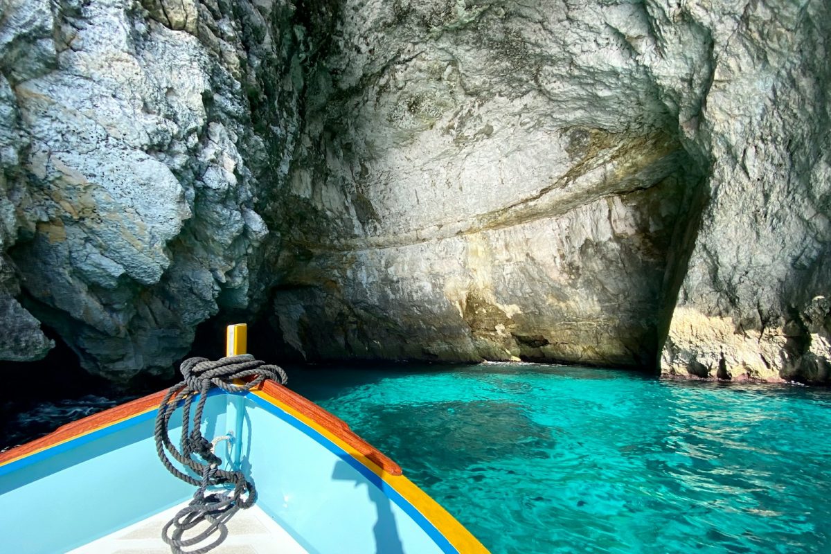 blue kayak on blue water